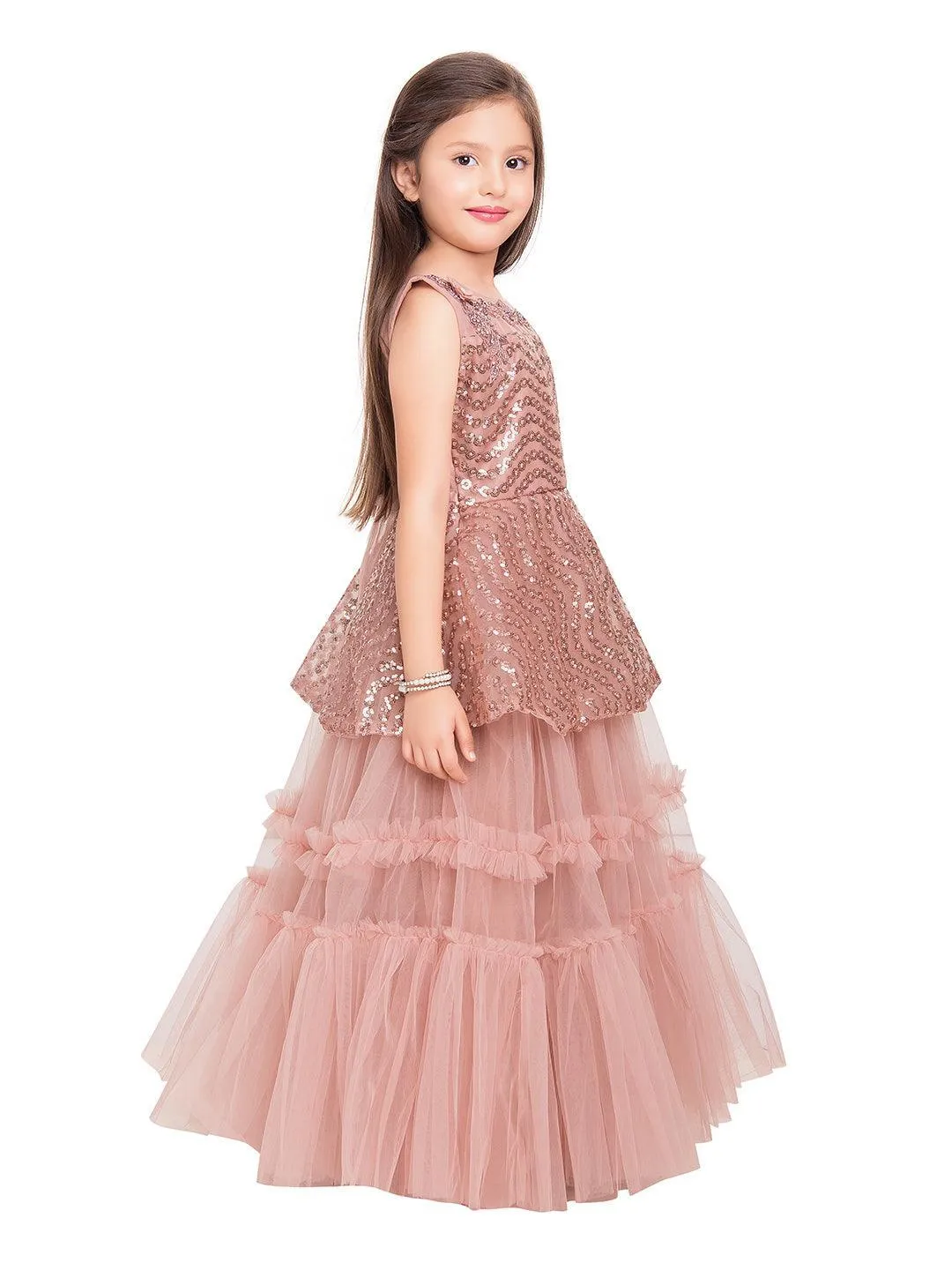 Orchid Coloured Embellished Peplum Styled Imported Net Gown For Girls